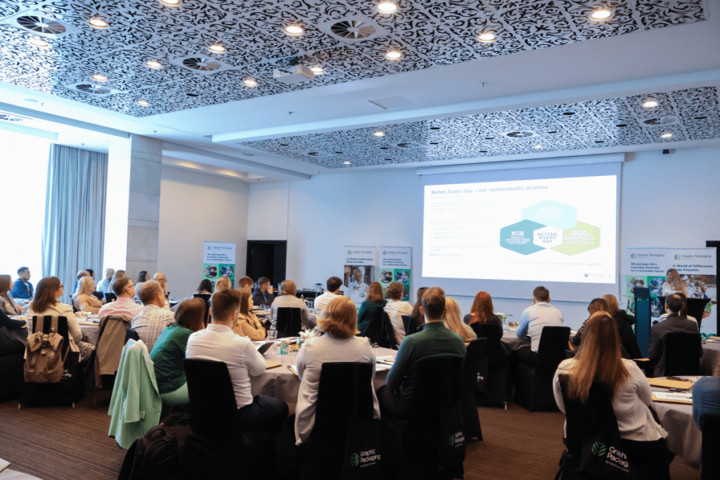 Elodie Bugnicourt, international sustainability director (far right), speaks to Graphic Packaging customers about global packaging regulations, such as PPWR, during European Carton College in Poznań, Poland, in June.