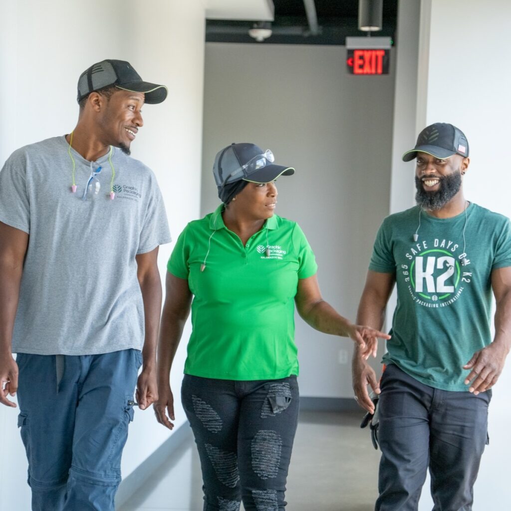 A group of employees talking