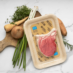 Pressed board tray with a steak